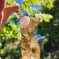 Pastel tone botanical and rose quartz and sunstone moonstone premade resin goddess.