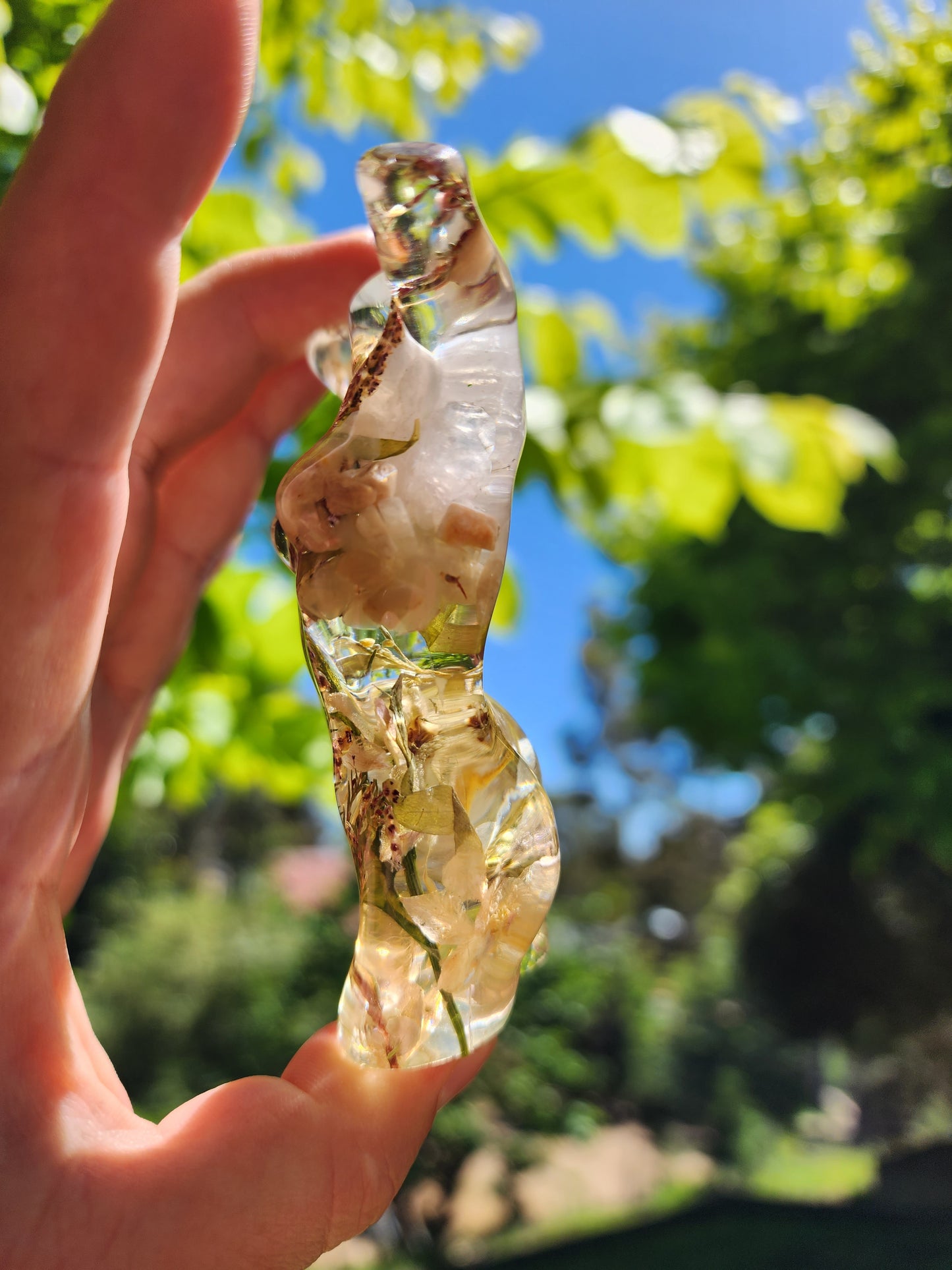 Pastel tone botanical and rose quartz and sunstone moonstone premade resin goddess.