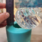 Exclusive Wavy/Spiral Pattern Tea-Light Candle Holder. Deep casting area for whole botanicals.